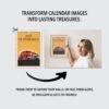 Woman framing 2027 Oldsmobile calendar page as wall art