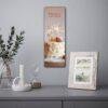 Birthday calendar with cake and sparklers hanging on wall