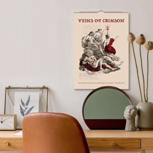 Veins of Crimson art calendar hanging above stylish desk