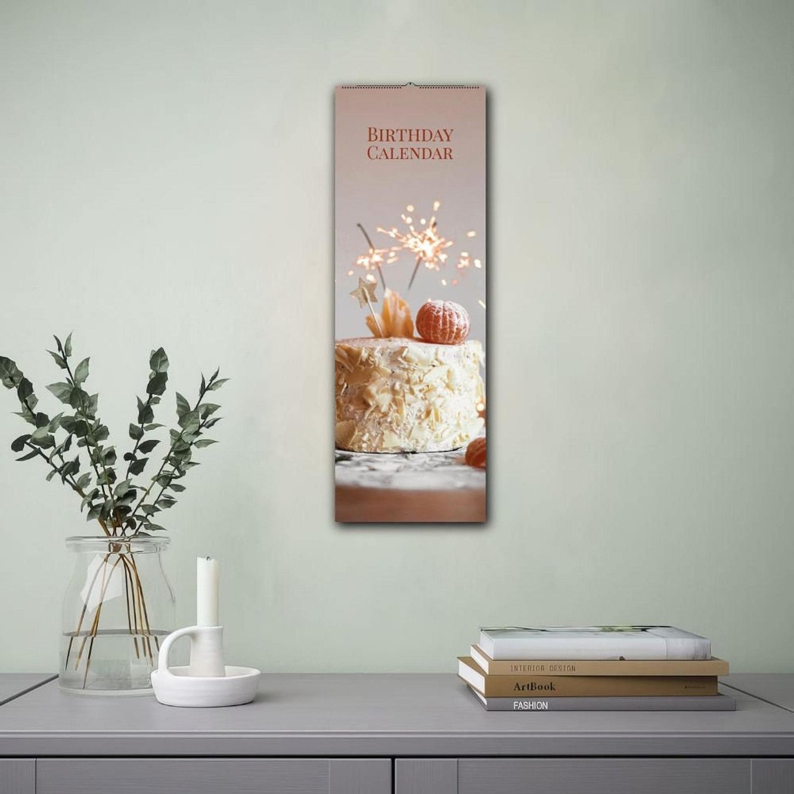 Birthday calendar with cake and sparklers on wall