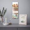 Birthday calendar with cake design hanging on gray wall