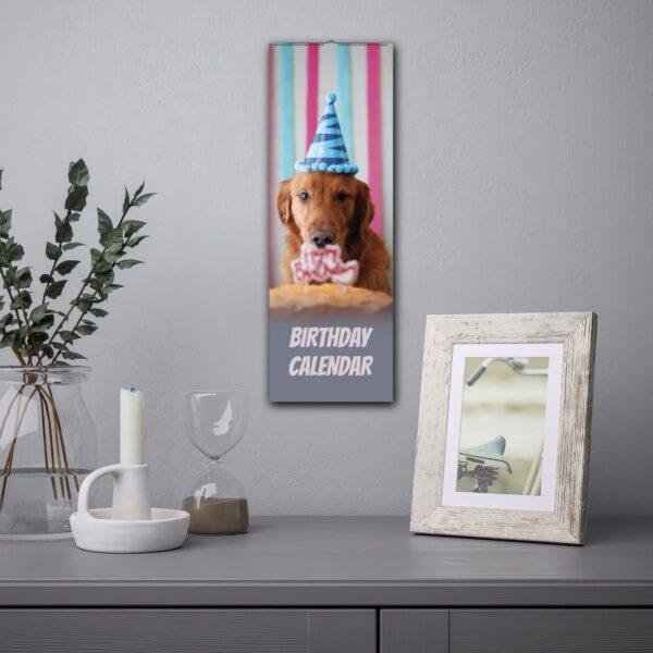 Golden retriever birthday calendar hanging on wall