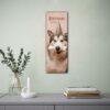 Husky dog birthday calendar hanging on green wall