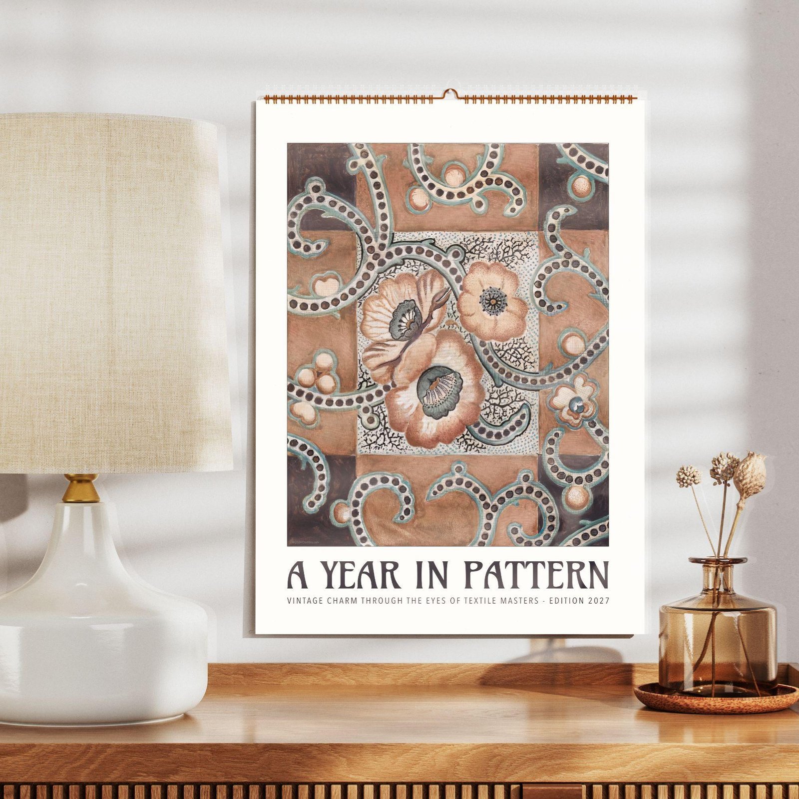 Vintage floral pattern wall calendar on wooden shelf