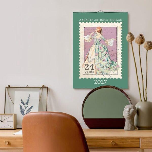 2027 artistic postage stamp wall calendar above stylish desk