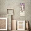 April wall calendar with vintage painting hung on gray wall