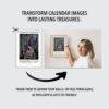 Woman framing calendar art print on wall