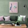 Modern living room with green sofa and floral wall art