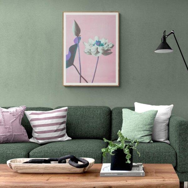 Modern living room with green sofa and floral wall art