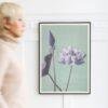 Framed lotus flower art print on white wall