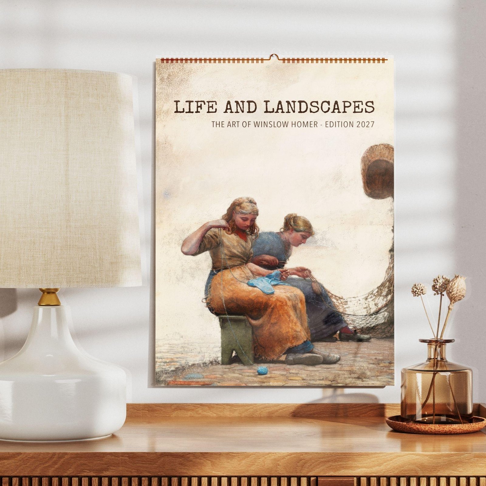 Winslow Homer 2027 wall calendar on wooden shelf