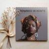 Crowned in Kente African fashion wall calendar with dried flowers