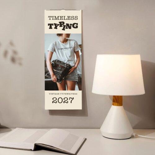 Timeless Typing 2027 vintage typewriter wall calendar on desk