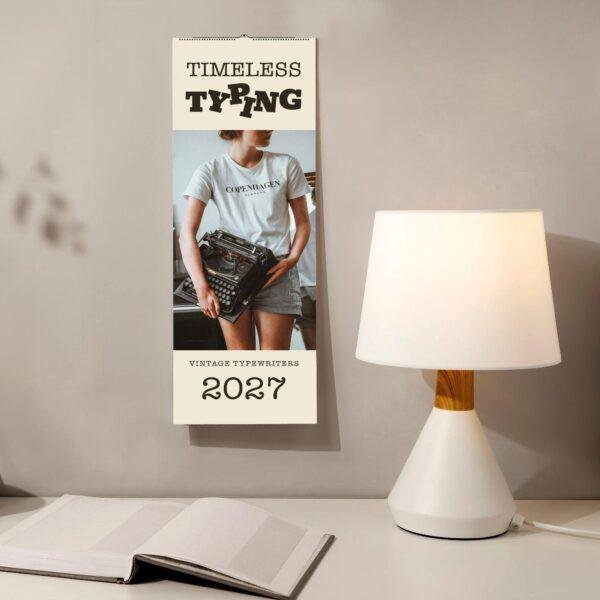 Timeless Typing 2027 vintage typewriter wall calendar on desk