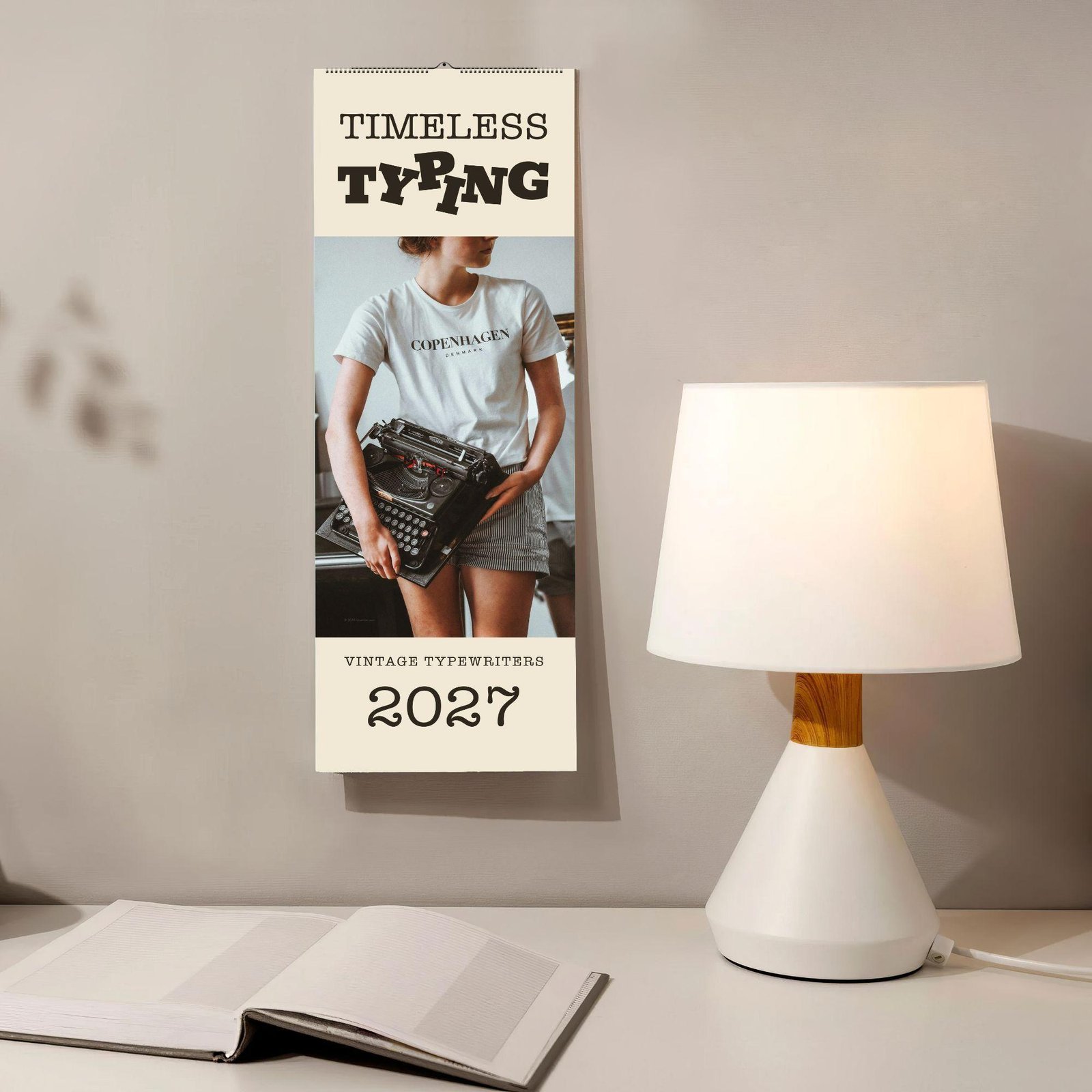 Timeless Typing 2027 vintage typewriter wall calendar on desk
