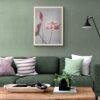 Modern green living room with pink lotus flower wall art