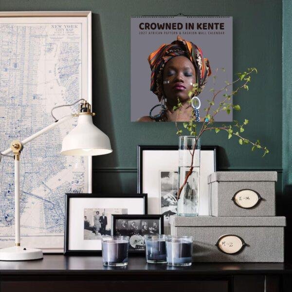Crowned in Kente 2027 African fashion wall calendar displayed on desk