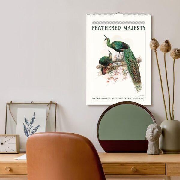 Feathered Majesty 2027 peacock wall calendar above stylish desk