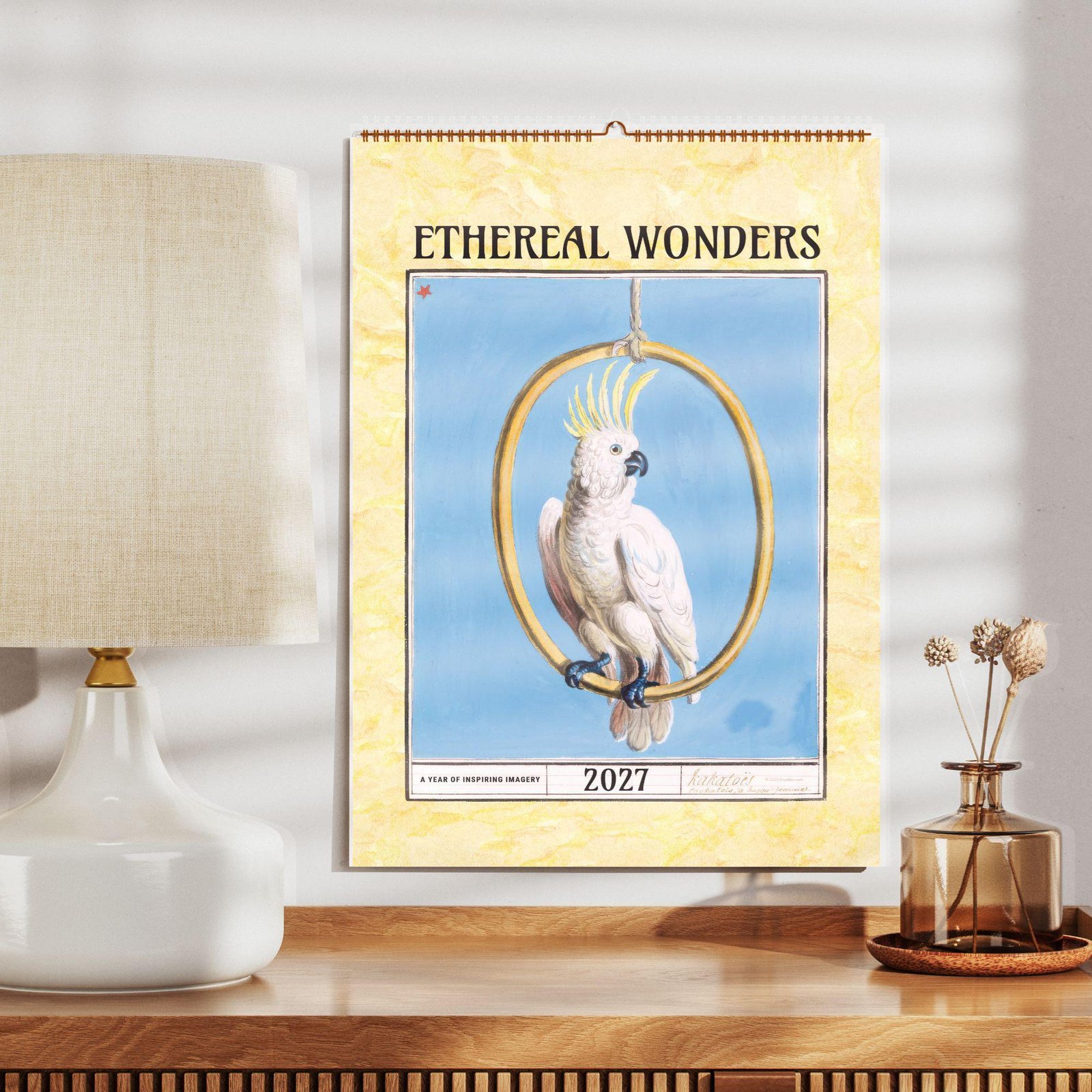 Ethereal Wonders 2027 wall calendar featuring cockatoo illustration