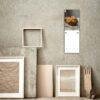 May 2027 bakery calendar hanging on rustic wall