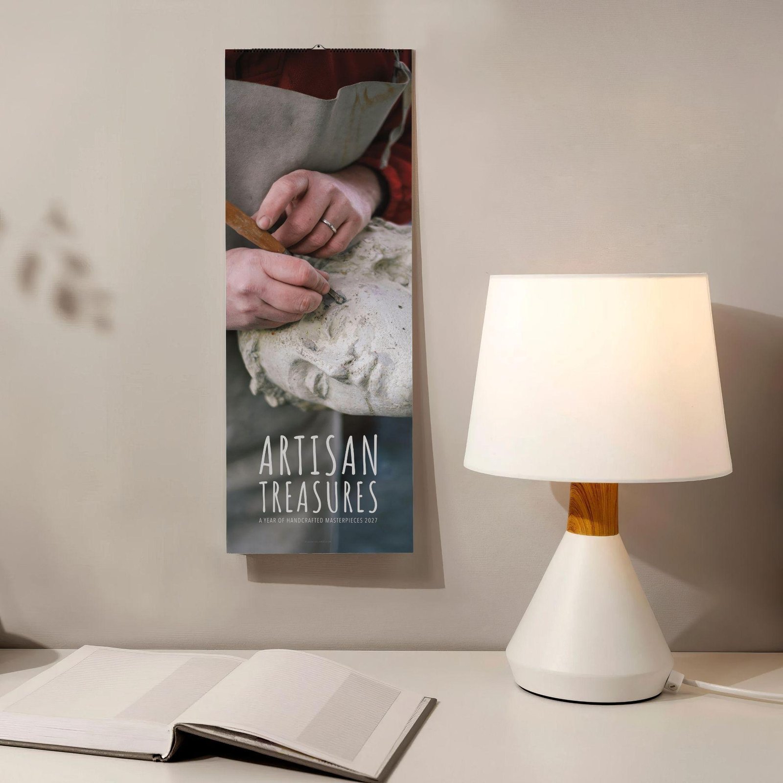 Artisan Treasures 2027 wall calendar with sculpture carving photo