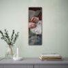 Artisan Treasures 2027 calendar hanging on wall above shelf