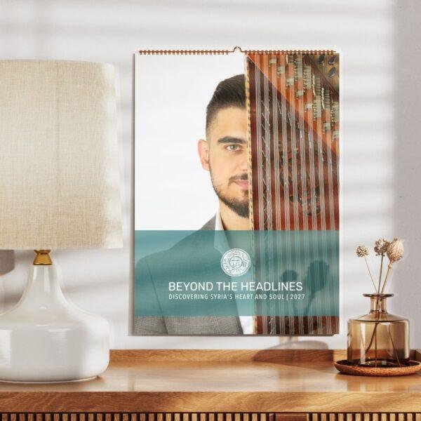2027 wall calendar featuring Syrian musician with qanun instrument