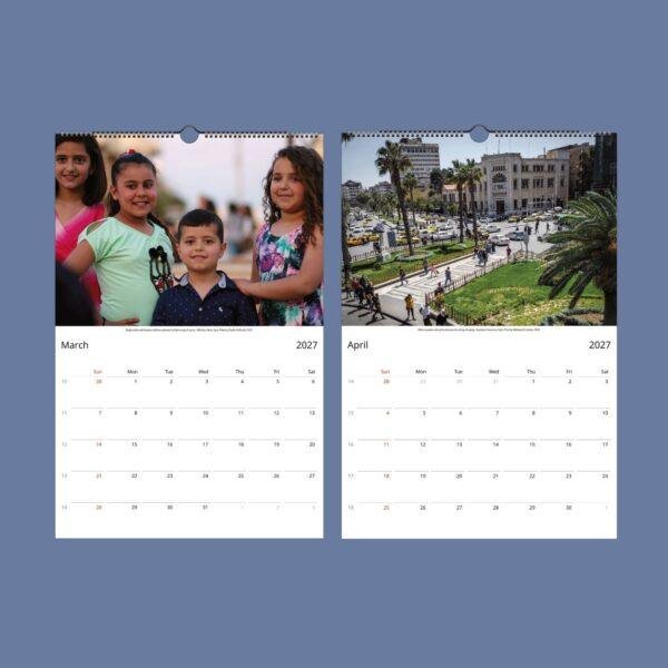 2027 wall calendar showing March and April pages with Syria photos