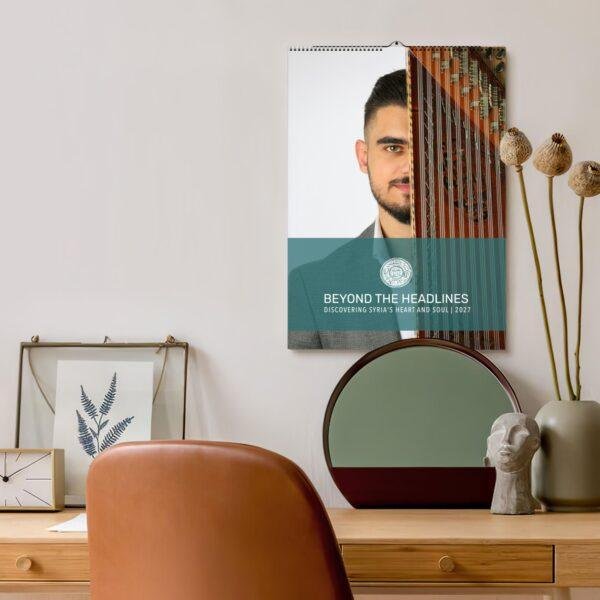 Beyond the Headlines Syria 2027 calendar displayed on wall