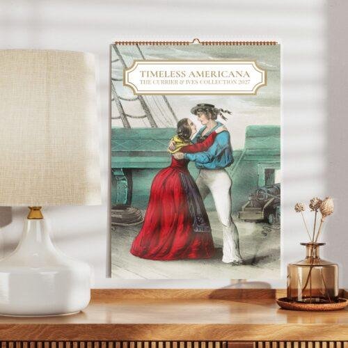 Currier and Ives 2027 wall calendar on wooden shelf