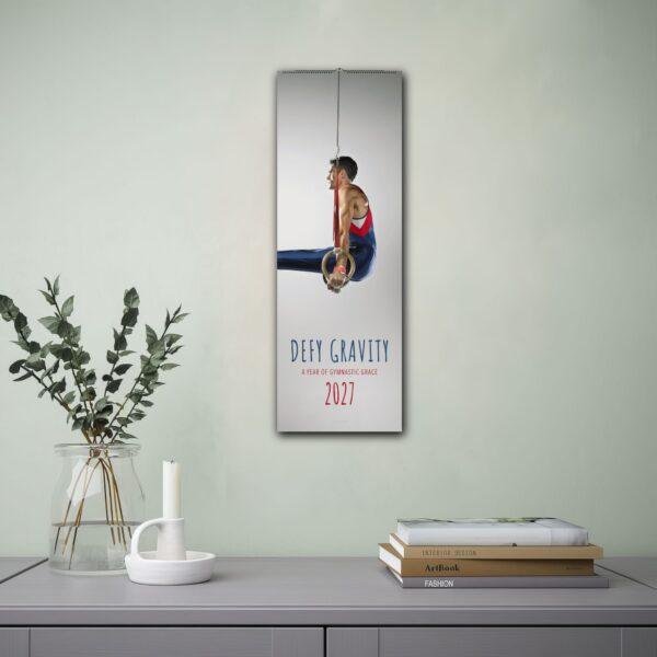 2027 gymnastics wall calendar featuring male gymnast on rings
