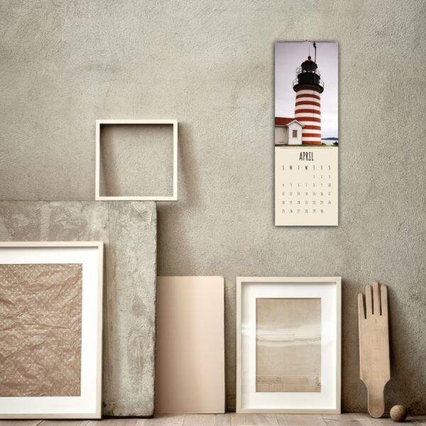 April wall calendar featuring red and white striped lighthouse