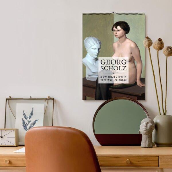 Georg Scholz New Objectivity 2027 wall calendar on modern desk
