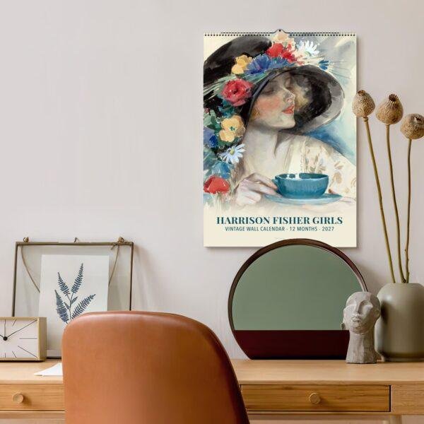 Harrison Fisher Girls 2027 vintage wall calendar on stylish desk