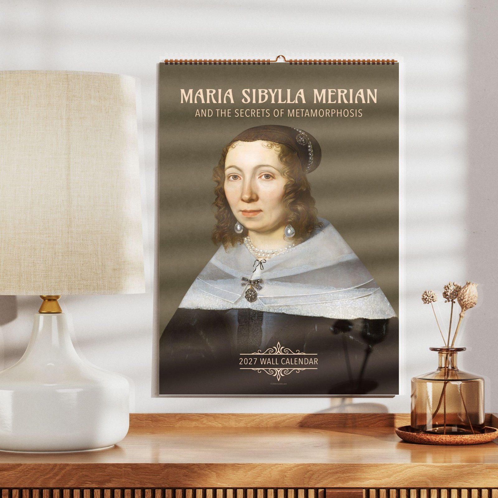 Maria Sibylla Merian 2027 wall calendar on wooden shelf