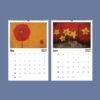 2027 wall calendar showing May and June with floral art