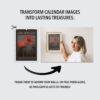 Woman framing Floral Impressions calendar art on wall
