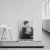 Vintage portrait poster leaning against white wall