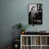 Ella Fitzgerald 1946 poster above vinyl record shelf