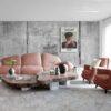 Modern living room with pink sofa and vintage poster