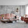 Modern living room with pink sofa and vintage poster